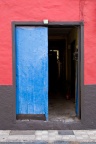 Porte Bleu sur mur Rouge - Fond iPhone